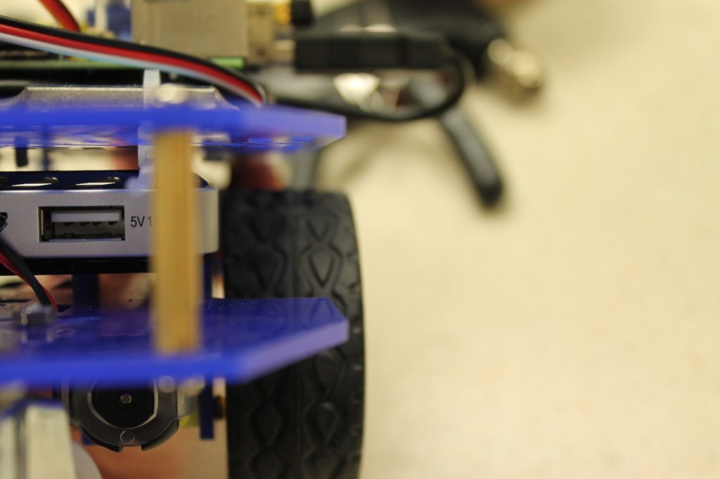 There should be a few millimetres of clearance between the battery pack and the wheels.